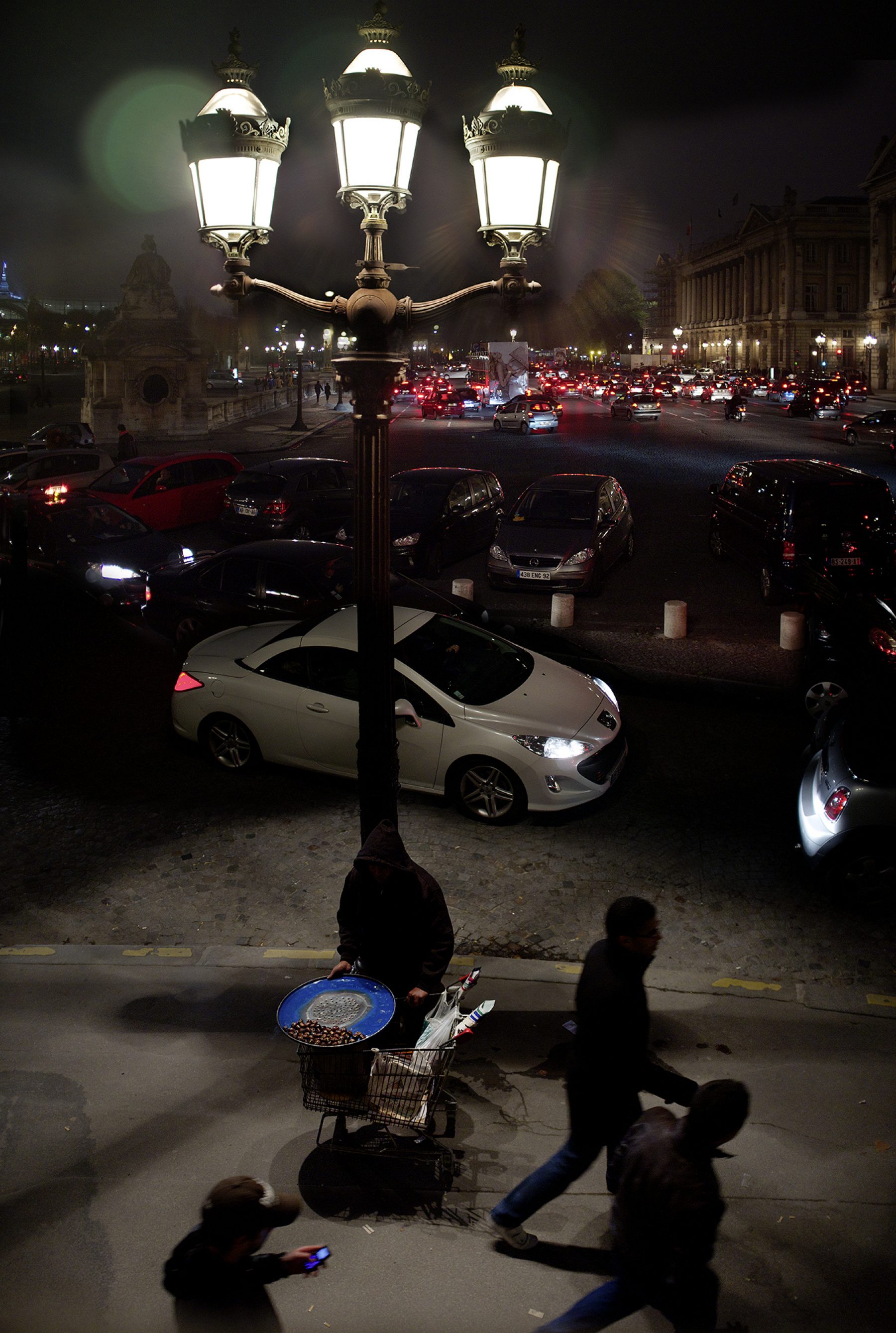 Place de la Concorde, Nacht, Maronenverkäufer, Straßenlaterne